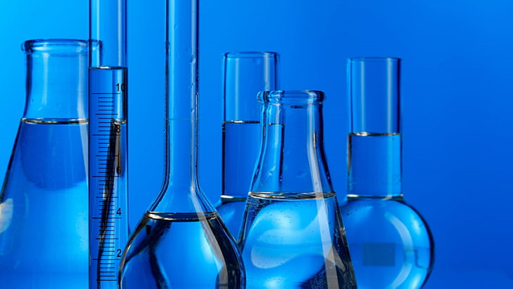 Sampling Laboratory Bottles on blue background
